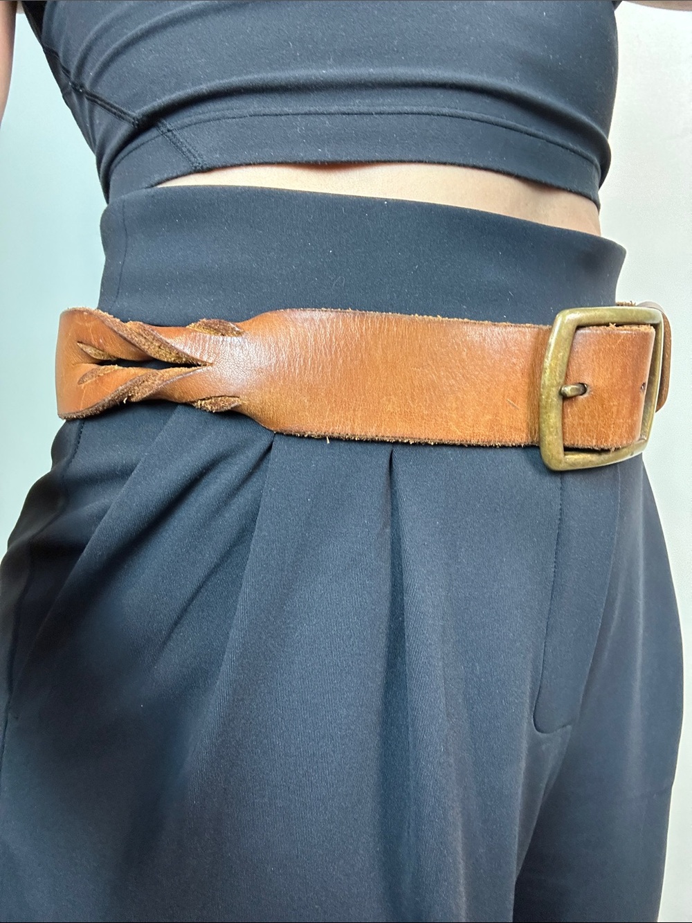 24. Vintage leather belt with brass buckle